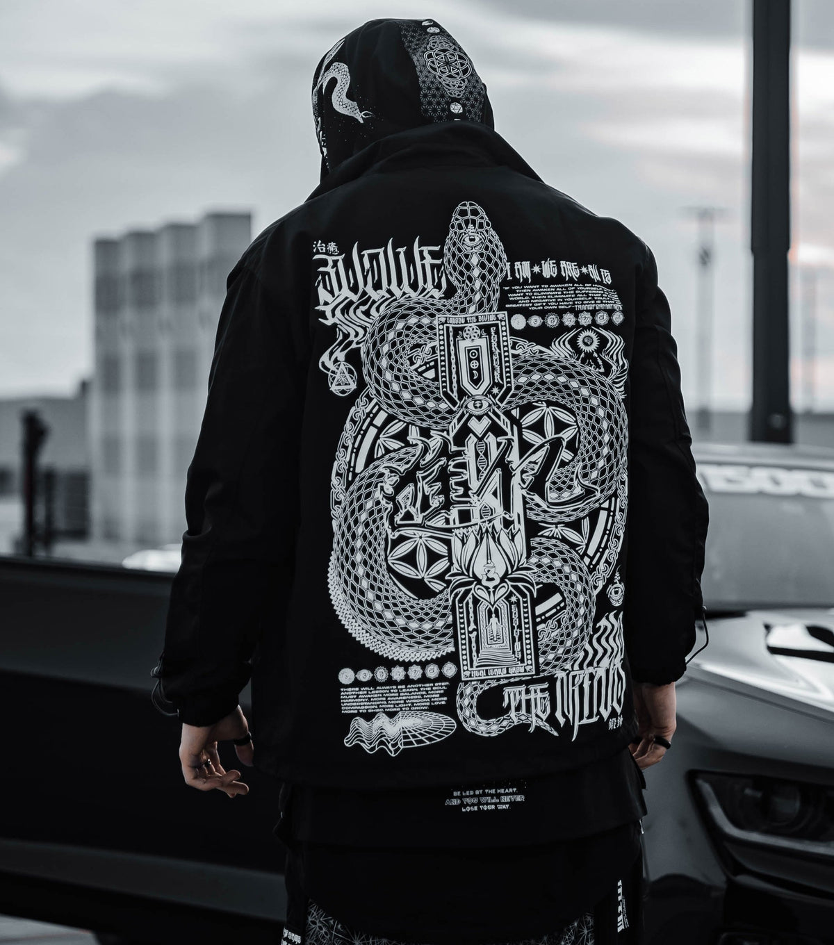 EVOLVE THE MIND • Waterproof Button-Up Windbreaker • AR Activated Jacket