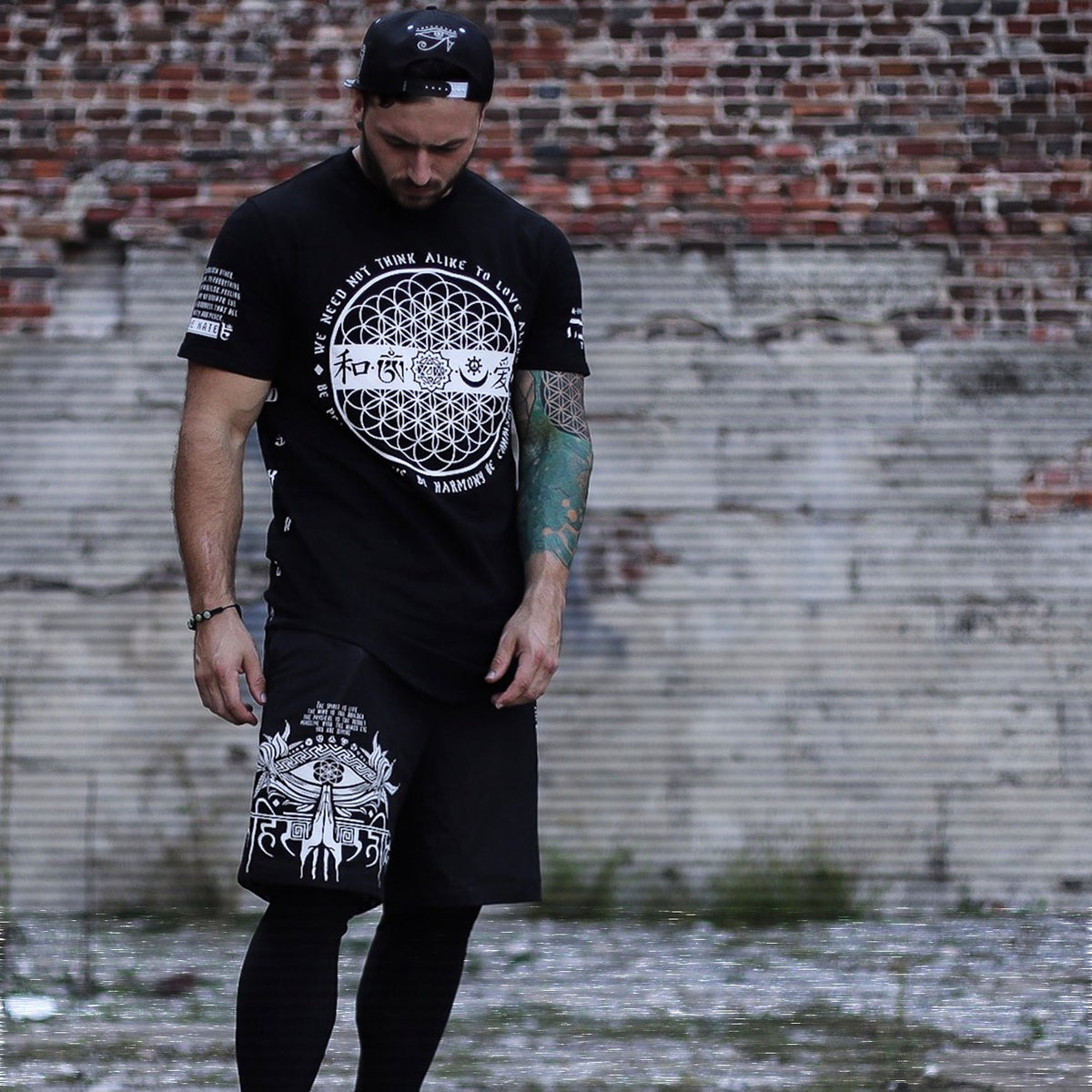 LOVE IS THE ONLY LAW • Scooped T-Shirt Apparel