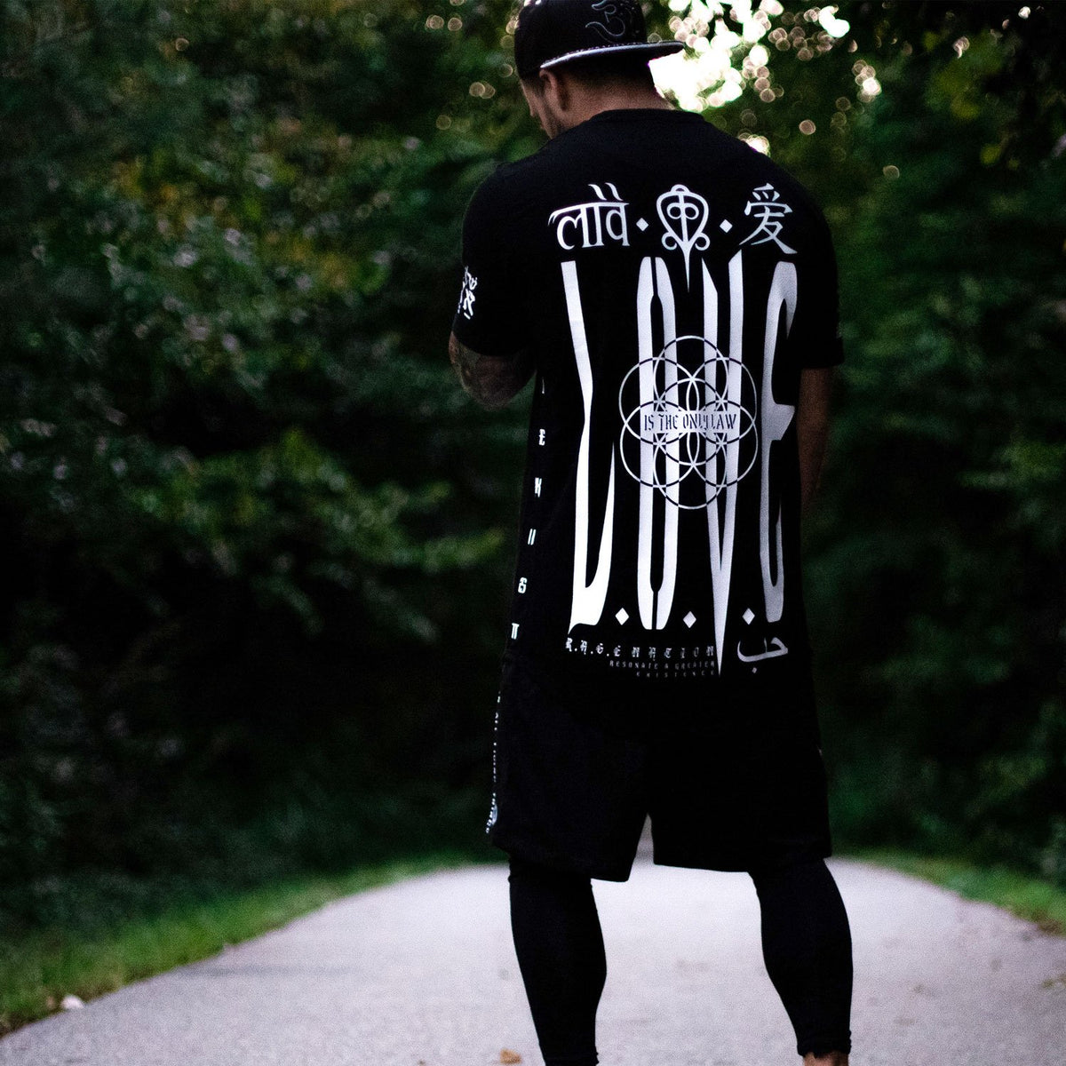 LOVE IS THE ONLY LAW • Scooped T-Shirt Apparel