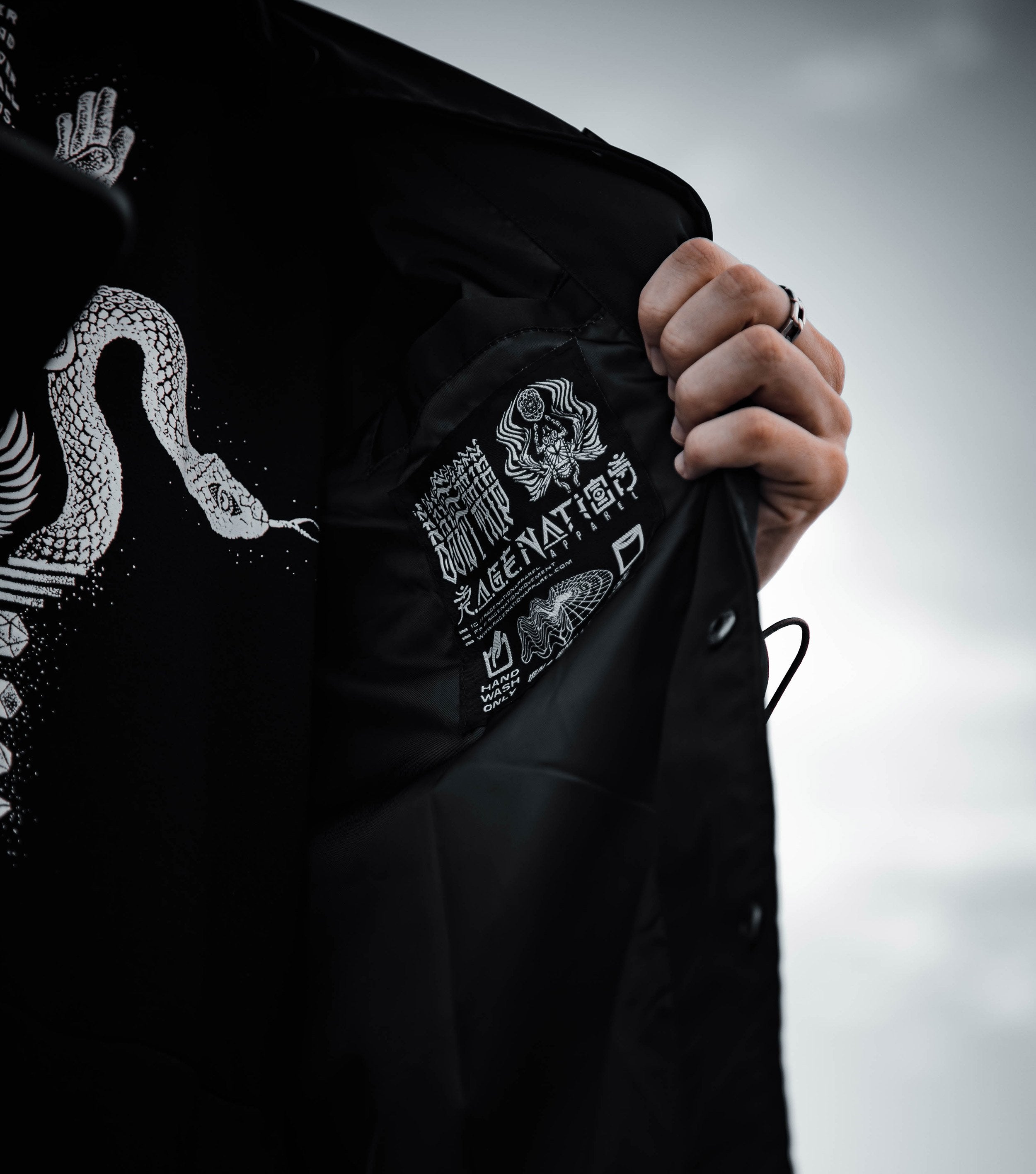 EVOLVE THE MIND • Waterproof Button-Up Windbreaker • AR Activated Jacket 